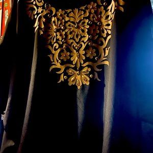 Black top with gold neckline